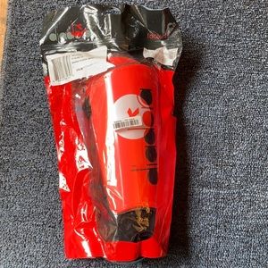 Orange New Diadora soccer shin guards with ankle